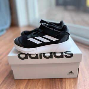 Adidas Kids' Black and White Slip-On Athletic Shoes